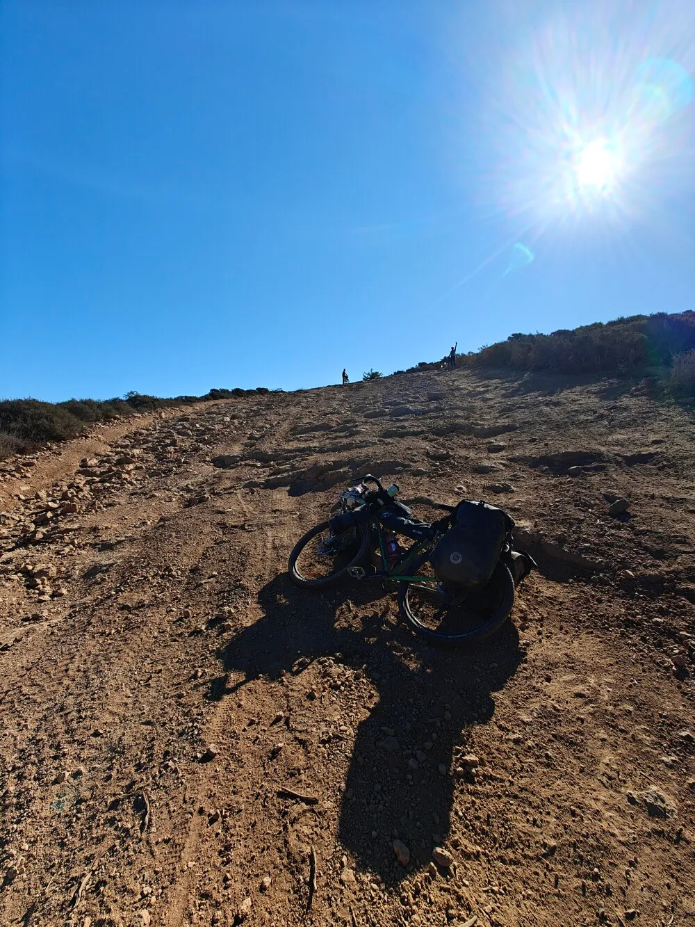 Pushing bikes up these hills