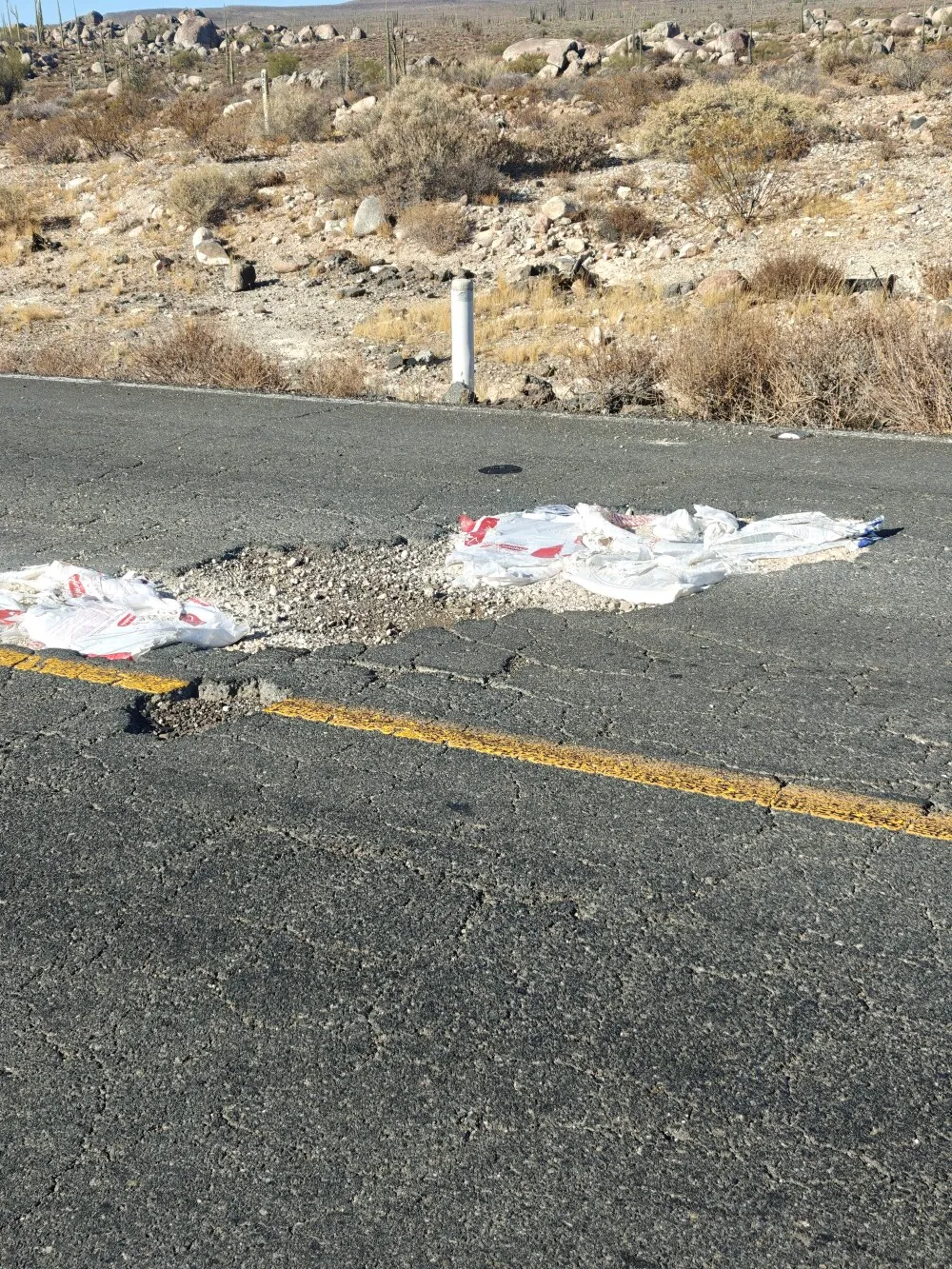 Potholes are pretty common on an otherwise good road. They can be pretty big.