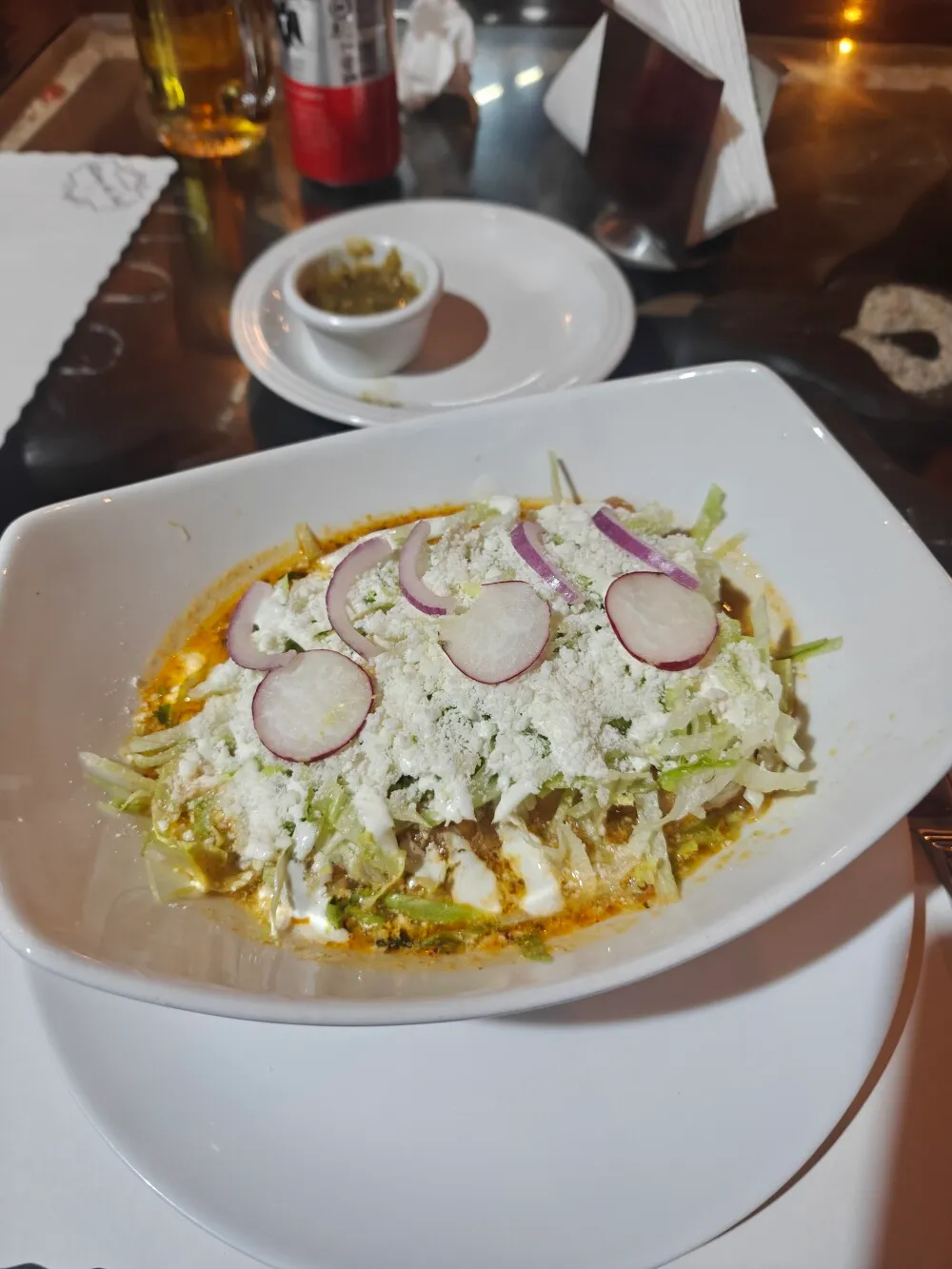 Forget what this is called but was hard shell tacos things covered in a soup. Was 10/10