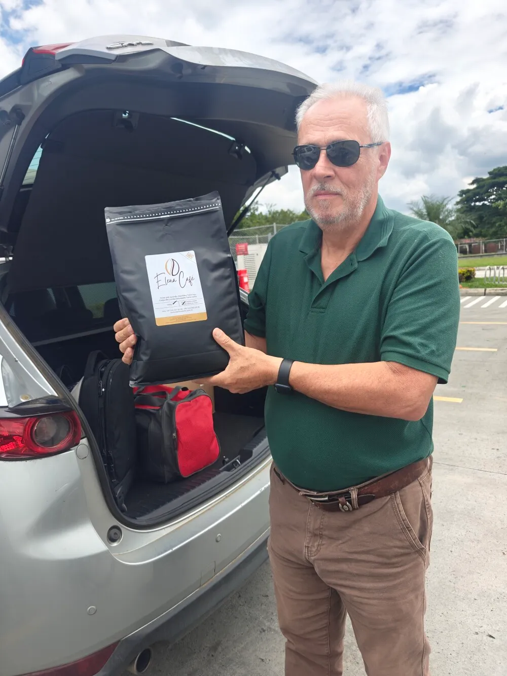 A kind coffee farmer that gifted me stories, sweets and some samples of his home grown and roasted coffee beans.